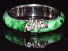 A c1920 18ct white gold ring set with jadeite and diamonds, 2.9g, size M