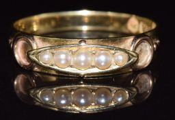 A c1900 15ct gold ring set with five seed pearls, 2.5g, size P