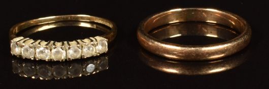 A 9ct gold wedding band and a 9ct gold ring set with cubic zirconia, 3.4g