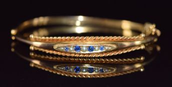 Victorian 9ct gold bangle set with paste and seed peals, Birmingham 1898, 6.1g