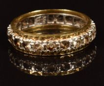 A 9ct gold eternity ring set with spinel, 3.8g