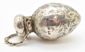 Victorian hallmarked silver scent bottle of egg shape, with engraved decoration of flowers and