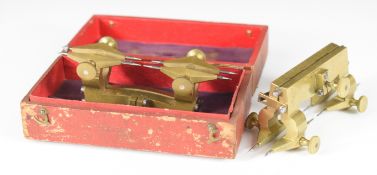 Two brass depthing tools, one cased
