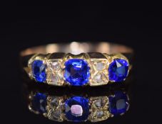 An 18ct gold ring set with doublets and rose cut diamonds, 1.6g, size P