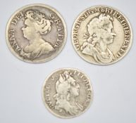 1696 William III sixpence, 1711 Queen Anne shilling and a 1723 George III South Sea Copper Company