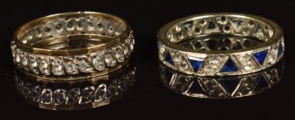 A 9ct gold eternity ring set with sapphires and spinel and a 9ct gold and silver eternity ring set