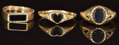 Three 9ct gold signet rings set with onyx, 3.6g, size K, N & H