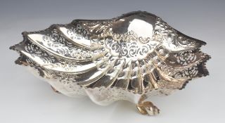 Victorian hallmarked silver centrepiece formed as a shell shaped bowl with pierced and embossed