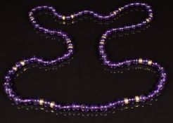 A beaded amethyst necklace set with 9ct gold beads