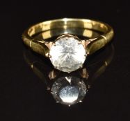 An 18ct gold ring set with a cubic zirconia, 3.9g, size N