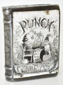 Victorian novelty hallmarked silver vesta case formed as a book with enamel decoration of Punch to