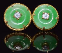 A pair of yellow metal earrings set with jade and a diamond to each, total diamond weight