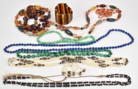 A beaded jadeite necklace, sodalite necklace, pearl necklace, pearl and garnet necklace, coral