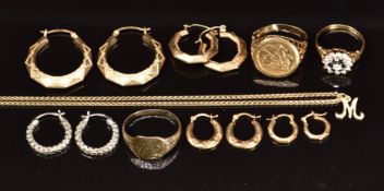 A 9ct gold ring set with sapphires and cubic zirconia, 9ct gold ring set with faux sovereign, four