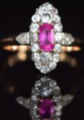 A late Victorian ring set with a pink sapphire surrounded by old cut diamonds, and with rose cut