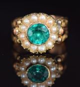 Georgian/ Victorian ring set with foiled paste surrounded by split pearls, with engraved