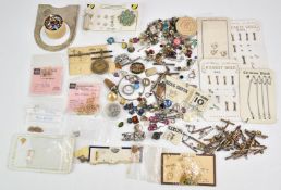 A collection of jewellery including silver clasps, 9ct gold clip, silver clips, loose paste