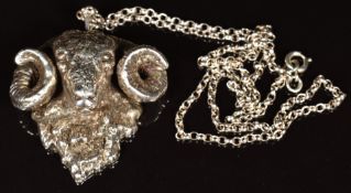 A hallmarked silver pendant in the form of a ram, on silver chain, maker C G & S, 72g