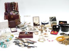 A collection of silver jewellery including silver necklace, Miracle brooch, watches, filigree