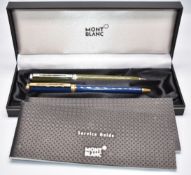 Two Montblanc Noblesse Oblige ballpoint pens, one with green resin body and chrome plated fitting