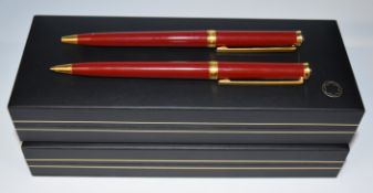 Montblanc Noblesse Oblige ballpoint pen and propelling pencil set each with maroon resin body and