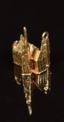 A 14ct gold charm in the form of a cathedral, 1.1g