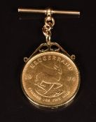 1974 1oz gold Krugerrand in 9ct gold mount on T bar, 40.6g