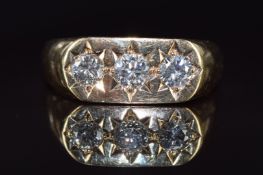A 9ct gold ring set with three diamonds, measuring 0.4ct, 0.3ct & 0.3ct in star settings, 5.5g, size