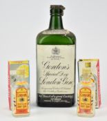 Vintage bottle of Gordon's gin 70% proof, and two vintage boxed Gordon's miniatures