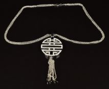 Roy King designer silver necklace in a design representing Chinese longevity, on silver chain