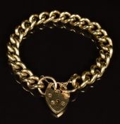 A 9ct gold curb link bracelet with heart padlock, 39g