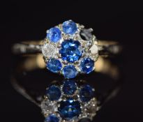 A 9ct gold ring set with sapphires and diamonds, 2.5g, size T