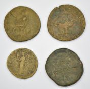Four Roman copper / bronze coins including Hadrian, smallest 28mm diameter, largest 34mm