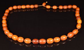 Baltic amber necklace made up of 37 beads, each 13 x 17mm, 66g