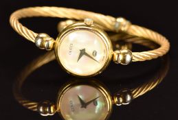 Gucci ladies bangle wristwatch ref. 2700L with gold dauphine hands, mother of pearl dial, gold