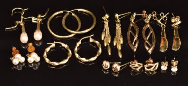 Ten pairs of 9ct gold earrings, two pairs set with pearls, 15g