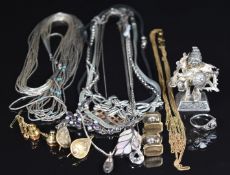 A silver figure carrying charms, silver necklaces, two 9ct gold tie pins (1.3g) and silver bracelet,