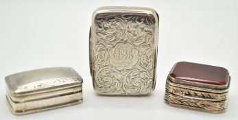 Three silver pill boxes comprising Victorian example with engraved decoration, Birmingham 1897,