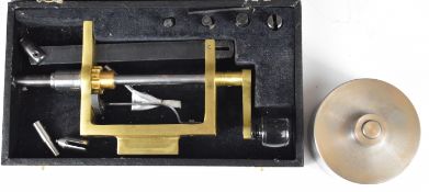 Clock / watch making / repairing brass main spring winders with accessories, in fitted case 14 x