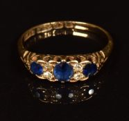 An 18ct gold ring set with sapphires and diamonds, Birmingham 1896, 3.2g