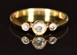 A 14k gold ring set with three cubic zirconia, 2.1g, size M