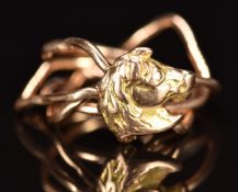 Victorian 9ct rose gold puzzle ring with horse decoration, 7.6g, size O