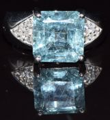 An 18k white gold ring set with paraiba tourmaline and diamonds, 8.7g, size N