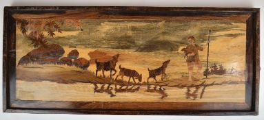Arts & Crafts style marquetry picture of a shepherd with kid being followed by three goats, 33 x