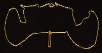 A 9ct gold necklace set with a diamond, 2.6g