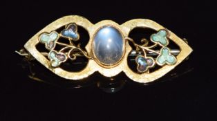 Arts & Crafts 15ct gold brooch set with moonstone and enamel with hammered decoration, maker WHH,