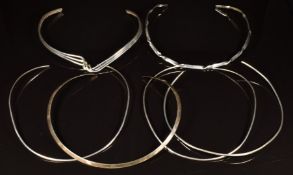 Six silver choker necklaces