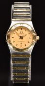 Omega Constellation ladies wristwatch with luminous hands, gold dial, back Roman numerals to the