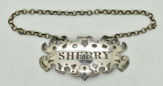 Victorian hallmarked silver sherry bottle ticket or label with pierced and engraved decoration,