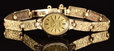 Avia 9ct gold ladies wristwatch with two-tone hands and baton hour markers, gold dial and 17 jewel